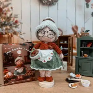 joli poupée au crochet dans ce kit crochet de miss apple pie